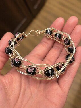 Gold Tone Braided Wire Bracelet with Purple Crystal Beads